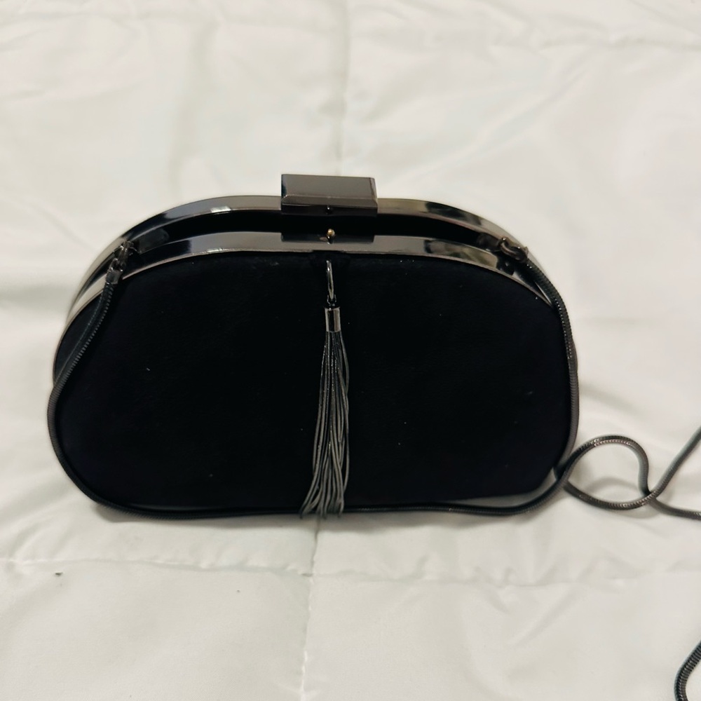 The Limited Black Clutch with Tassel and shoulder straps